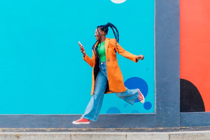 Woman-running-while-looking-at-phone